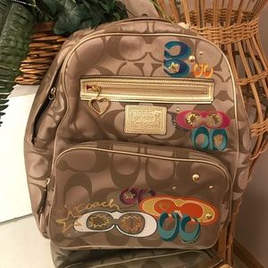 Coach gold poppy backpack